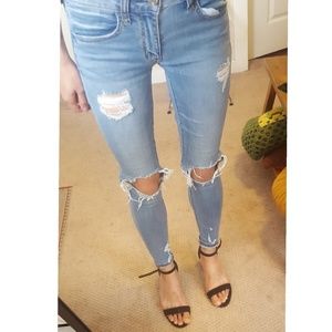 Busted knee ripped distressed jegging jeans